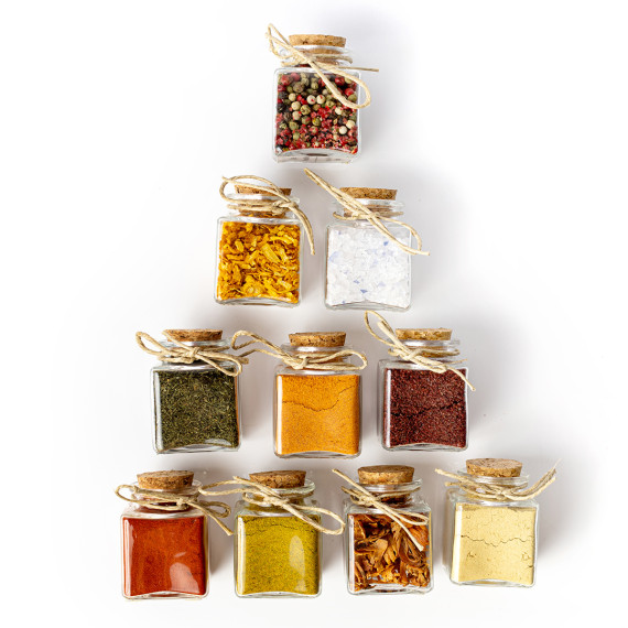 Favor box with spices or tea in glass jars