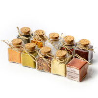 Favor box with spices or tea in glass jars