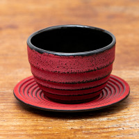 Cast iron cup with saucer